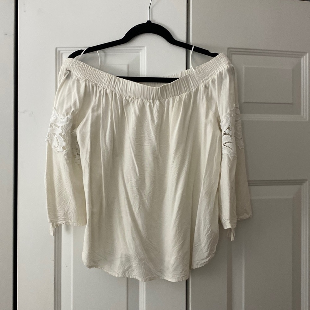 Off the shoulder, open back, lace sleeve top